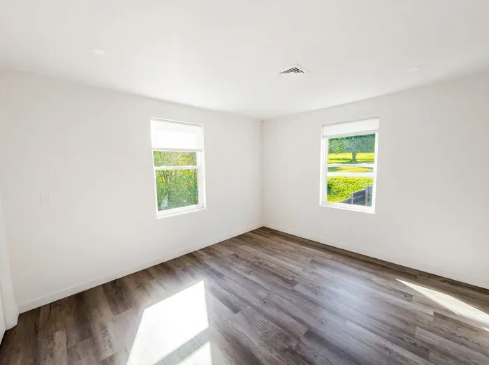 Bedroom with dual windows
